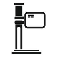 Glyph icon of a microscope standing on a laboratory table vector