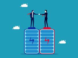 two businessmen shaking hands on top of two batteries vector