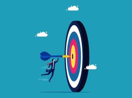 man hitting target with arrow in business concept vector