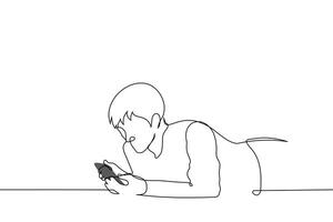 man lying on his stomach with phone in hand covered with blanket - one line art . concept night surfing the internet vector
