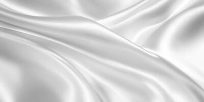 Closeup of rippled white, grey, silver satin fabric texture background. Luxurious background design photo