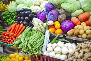 Vegetables and fruits at open air market photo