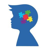 A silhouette of a child's head with puzzle pieces in it vector