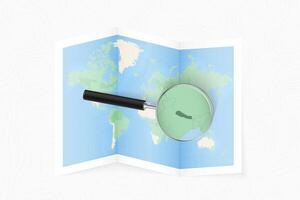 Enlarge Nepal with a magnifying glass on a folded map of the world. vector