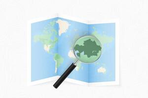 Enlarge Kazakhstan with a magnifying glass on a folded map of the world. vector
