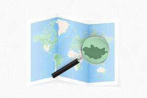 Enlarge Mongolia with a magnifying glass on a folded map of the world. vector