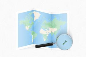 Enlarge New Zealand with a magnifying glass on a folded map of the world. vector