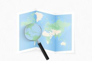 Enlarge Jamaica with a magnifying glass on a folded map of the world. vector