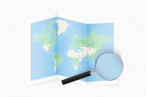Enlarge Tuvalu with a magnifying glass on a folded map of the world. vector