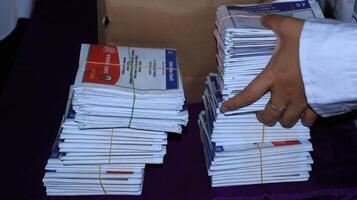 Voting atmosphere at TPS Tempat Pemungutan Suara Indonesian Polling Place photo