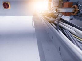 The wiring circuit path leads to the machine control panel. photo