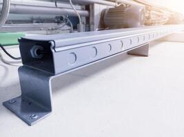 Installation of tray cable circuit on power line control machinery. photo