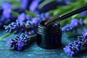 Sleek mascara tubes in glossy black, with blurred lavender flowers in the background. Professional shot emphasizing the sleek design and intense color of the mascara tubes. photo