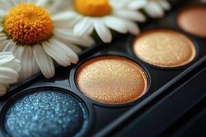 Shimmering eyeshadow palette with gold and bronze tones, with softly focused daisies in the background. Professional shot highlighting the luxurious and versatile colors of the palette. photo