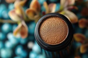 Radiant bronzer sticks with a golden sheen, with a blurred background of orchids. Professional shot emphasizing the warm tones and luxurious finish of the bronzer sticks. photo