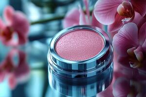 Compact powder cases with mirror finish, set against a backdrop of softly blurred orchids. Professional shot highlighting the sleek design and reflective quality of the powder cases. photo