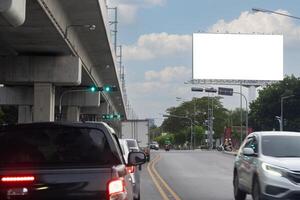 A blank billboard on one of Thailand's streets, a blank billboard with copy space for text or content photo