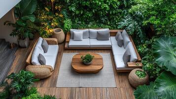 Modern white sofa surrounded by greenery in a biophilic architectural design photo