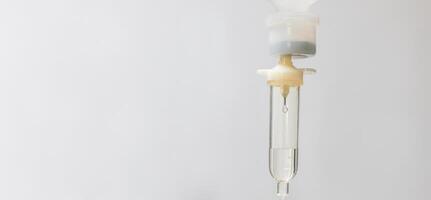 Saline drip in the hospital. 0.9 Normal saline solution NSS. Set vitamin iv fluid intravenous drop Because it is influenza A. Concept about of treatment, emergency, medical, chemotherapy, sick. photo