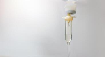 Saline drip in hospital. 0.9 Normal saline solution NSS. Set vitamin iv fluid intravenous drop Because it is influenza A. Concept about of treatment, emergency, medical, chemotherapy photo