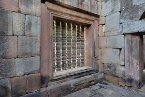 Mahad pillar of the window at Prasat Muang Tam historical park. photo