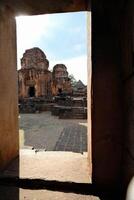 View point from rock window of Prasat Muang Tam, Ancient Historical castle in Thailand. photo