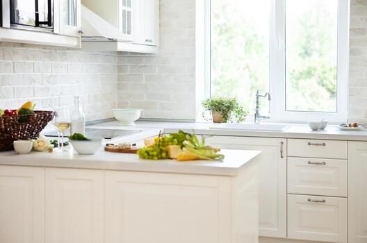 Classical white kitchen with healthy food photo
