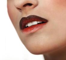 Red gloss lips with ombre effect photo