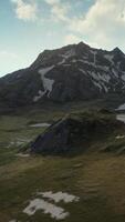 An aerial view of a mountain range with snow video