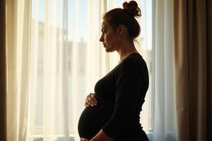 photo of silhouette pregnant woman with white curtain in background,