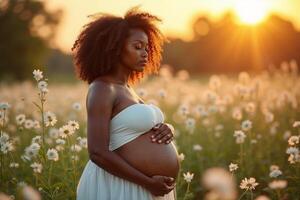 photo of pregnant woman standing in flower meadow field in sunset evening,