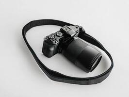 a camera strap with a black camera attached to it photo
