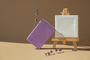 Paper note template mock up copy space Handcrafted purple lavender soap with lavender flowers. Natural hydrating moisturiser softness cosmetic. Organic calming beauty skincare product. Herbal self care wellness alternative soap. Copy space photo