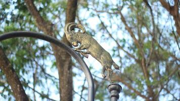 image of a horse statue on a pole photo