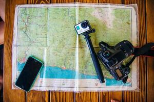 set of blogger and map on the table photo