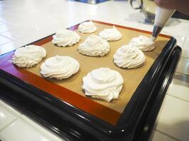 Chef making meringue photo