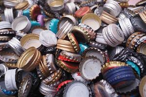 turkey istanbul 18 january 2024. Assorted bottle caps create a colorful background, ideal for beverage, beer, and soda designs photo