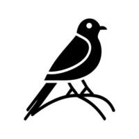 A black and white bird sitting on a branch vector