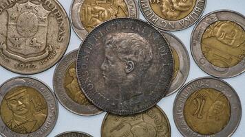 a group of coins with the image of a woman on them photo