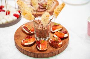 Tasty appetizers on the table photo