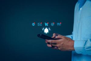 Application notification alert concept. Business people using smartphone with virtual bell ringing, New email, digital marketing, electronic message alert, online shopping connect via internet network photo