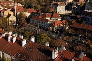 Colorful rooftops and railway tracks in the city in Vysehrad in Prague photo