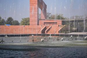 Fountain in the complex of Bharat Mandapam formally known as Pragati Maidan in Delhi India, working fountain in the Bharat Mandapam complex, water in the fountain, fountain in the Bharat Mandapam Park photo