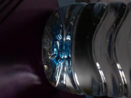 Abstract background close up of Water bottle detail that glows like crystal photo