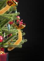 Christmas background with christmas tree, red gift boxes and copy space, 3D rendering photo