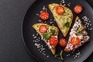 Crispy sandwich or bruschetta with guacamole, tuna and flax seeds photo