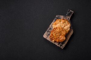 Delicious fried pork or chicken chops breaded with salt and spices photo