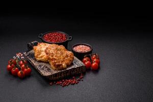 Delicious fried pork or chicken chops breaded with salt and spices photo