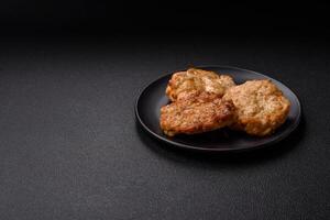Delicious fried pork or chicken chops breaded with salt and spices photo