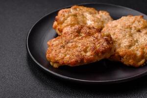 Delicious fried pork or chicken chops breaded with salt and spices photo